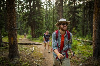 People hiking in the woods