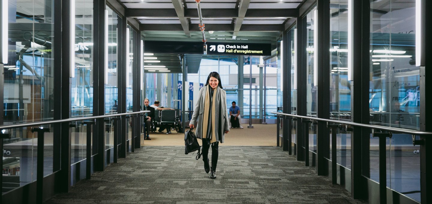 Female walking through the Edmonton International Airport