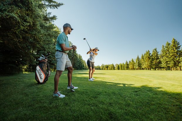 Couple golfing at Grande Prairie Golf and Country Club.