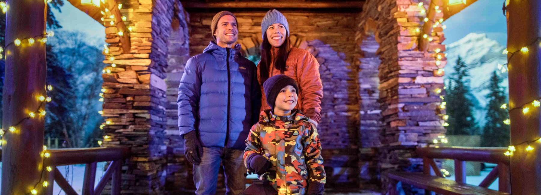 Visitors experiencing the event In Search of Christmas Spirit - a live Christmas story told by the wildlife of Banff National Park and delivered by a sensory extravaganza of light and sound.