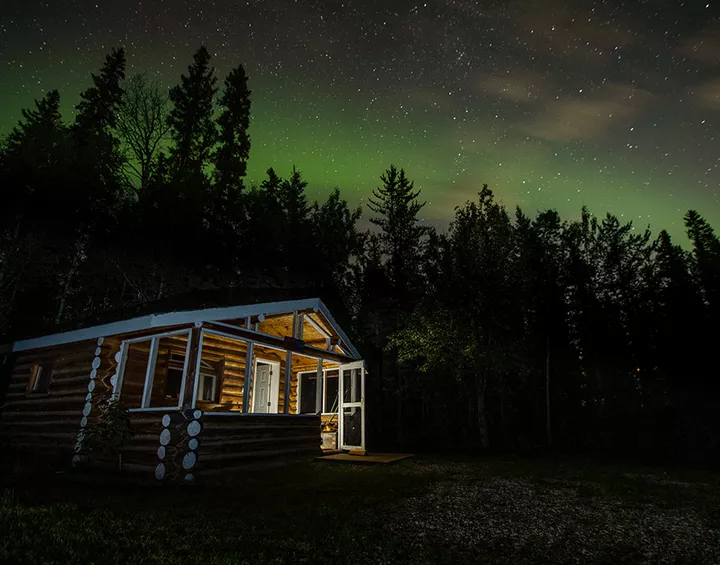 Northern Lights at a Pine Lake Cabins in Wood Buffalo National Park near Fort McMurray.