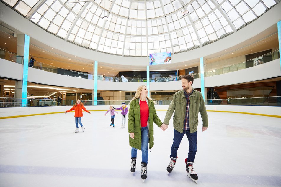 Couple skating at the Ice Palace in West Edmonton Mall.