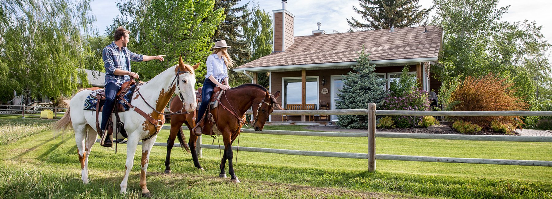 Guests horseback riding, Canadian Badlands.