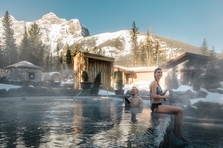 A couple in the pool at Kananaskis Nordic Spa.
