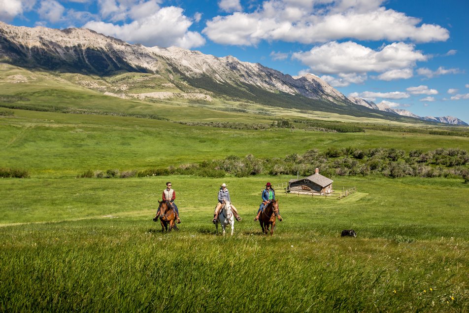 Guests horseback riding at Centre Peak High Country Adventures