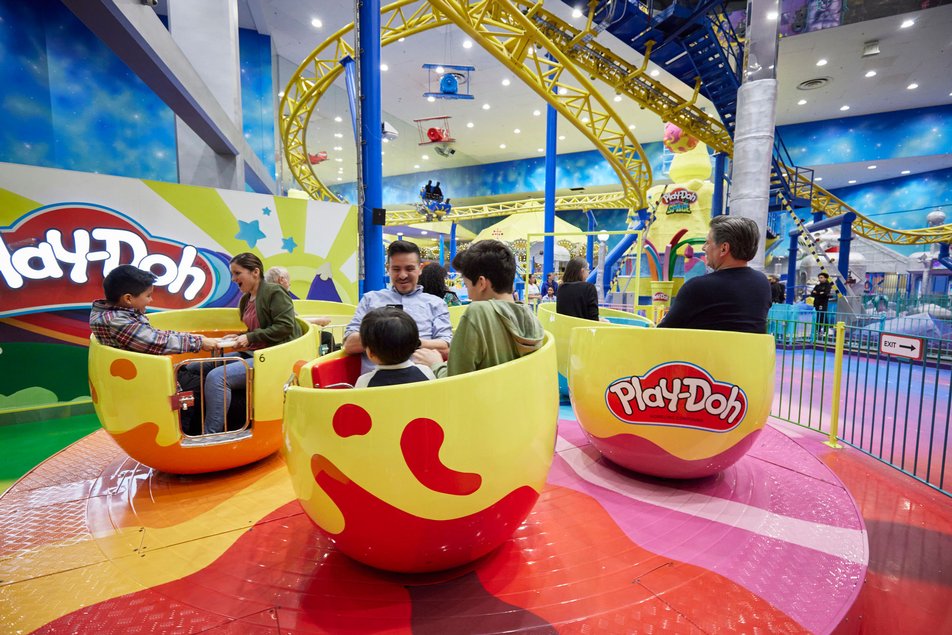 Kids and families enjoying the rides at Galaxyland at West Edmonton Mall.