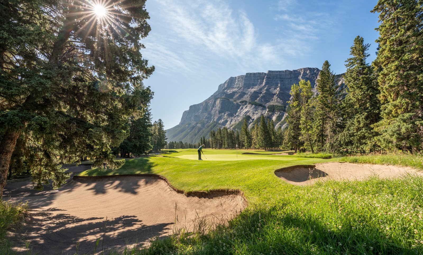 Person golfing at Fairmont Banff Springs Golf Course.