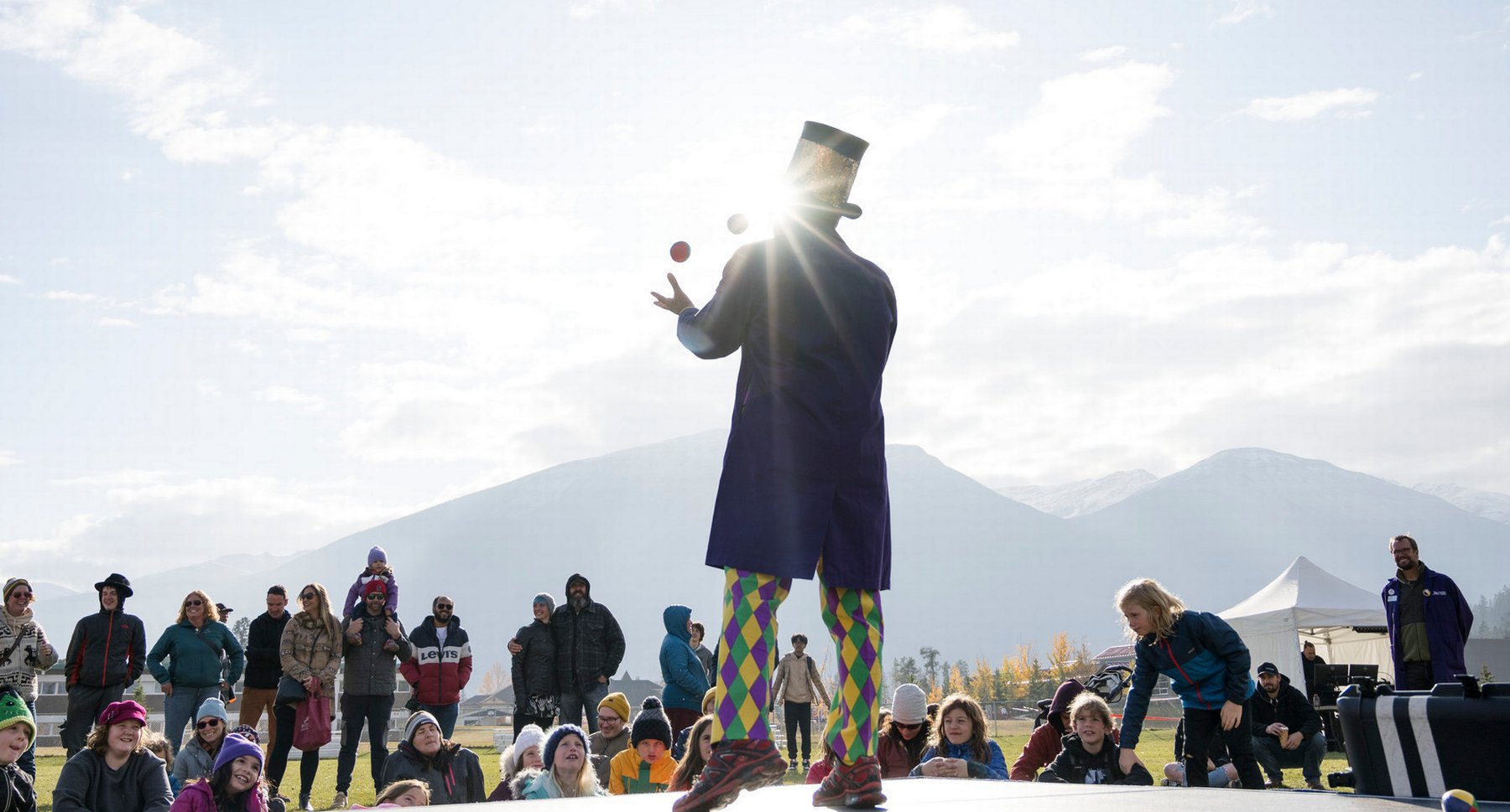 A juggler performing in front of a crowd at Science Fest in Jasper.
